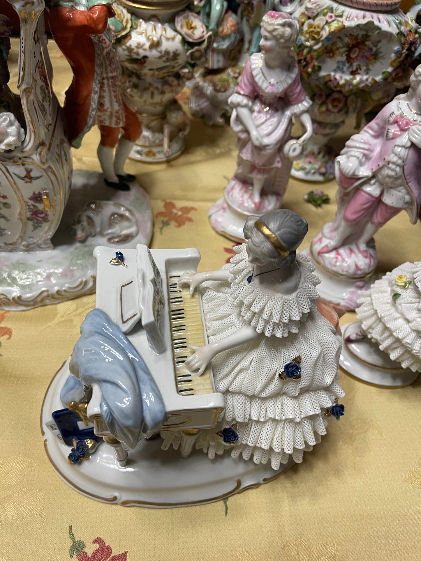 Vintage Royal Dux Bohemia Porcelain Lady at the Piano Figurine, White Porcelain with Blue Applied Roses & Pink Bow — Mid-Century European Figurine