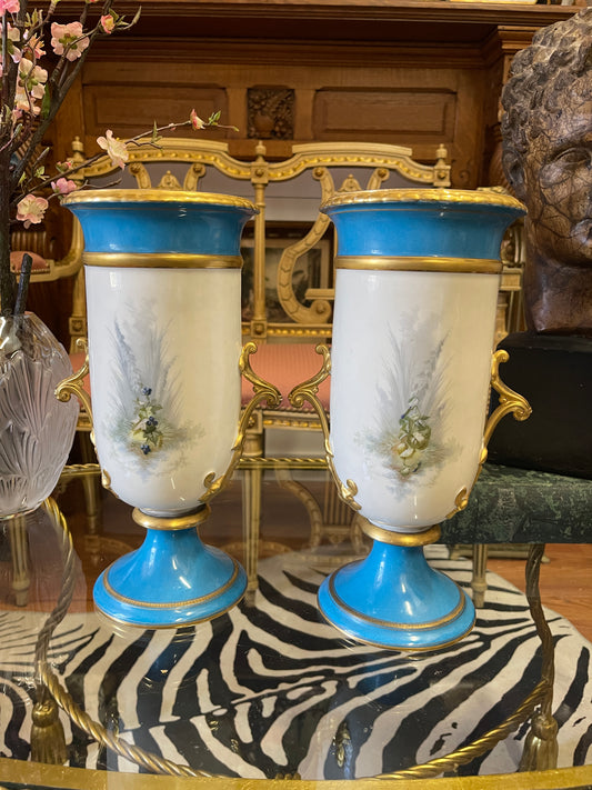 Pair of Antique French Porcelain Urns with Hand-Painted Cherub Scenes