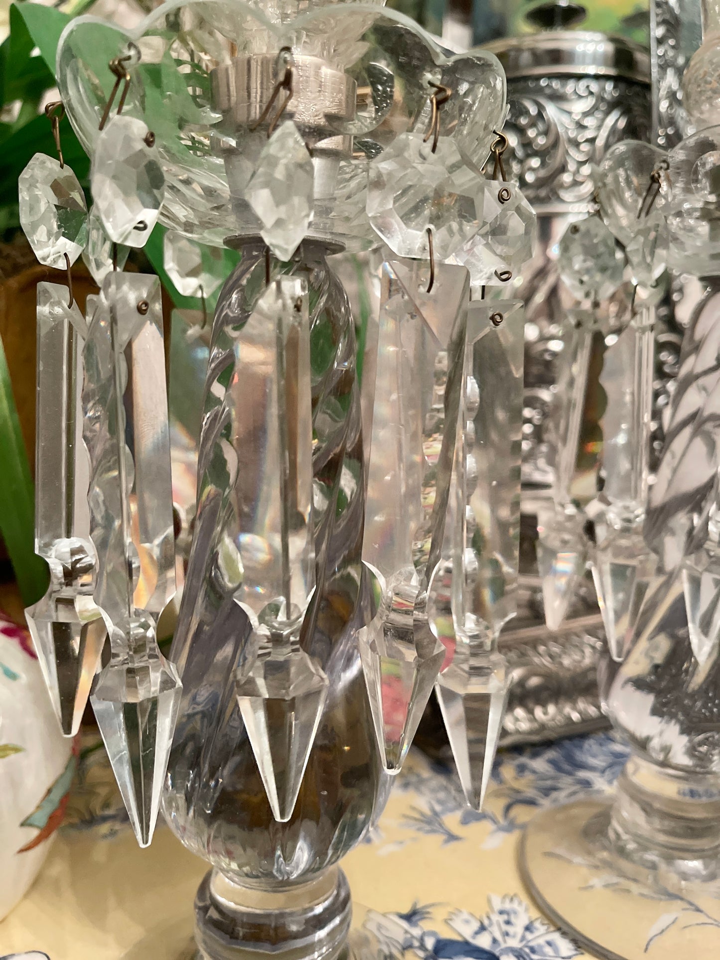 Vintage Fostoria candlesticks with blush pink votives with lusters and long prisms. This pair is truly stunning!