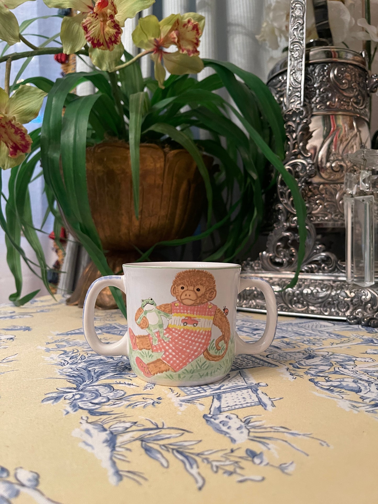 Darling Monkey in Pink Smocked Romper Double Handled Child’s Cup by Kelly B Rightsell, Made in Portugal