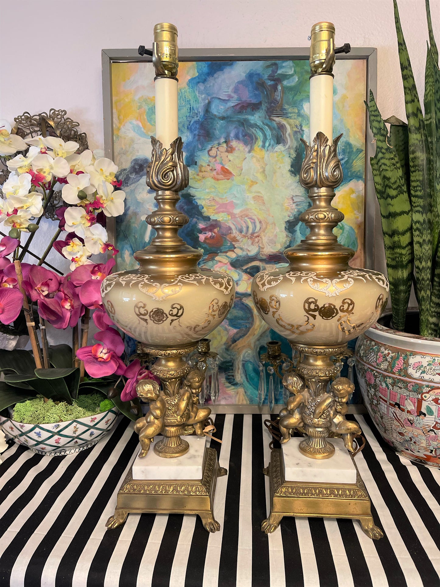 Pair of Hollywood Regency Double Gilt Tole Cherub and Brass Ormolu Lamps, Mid Century