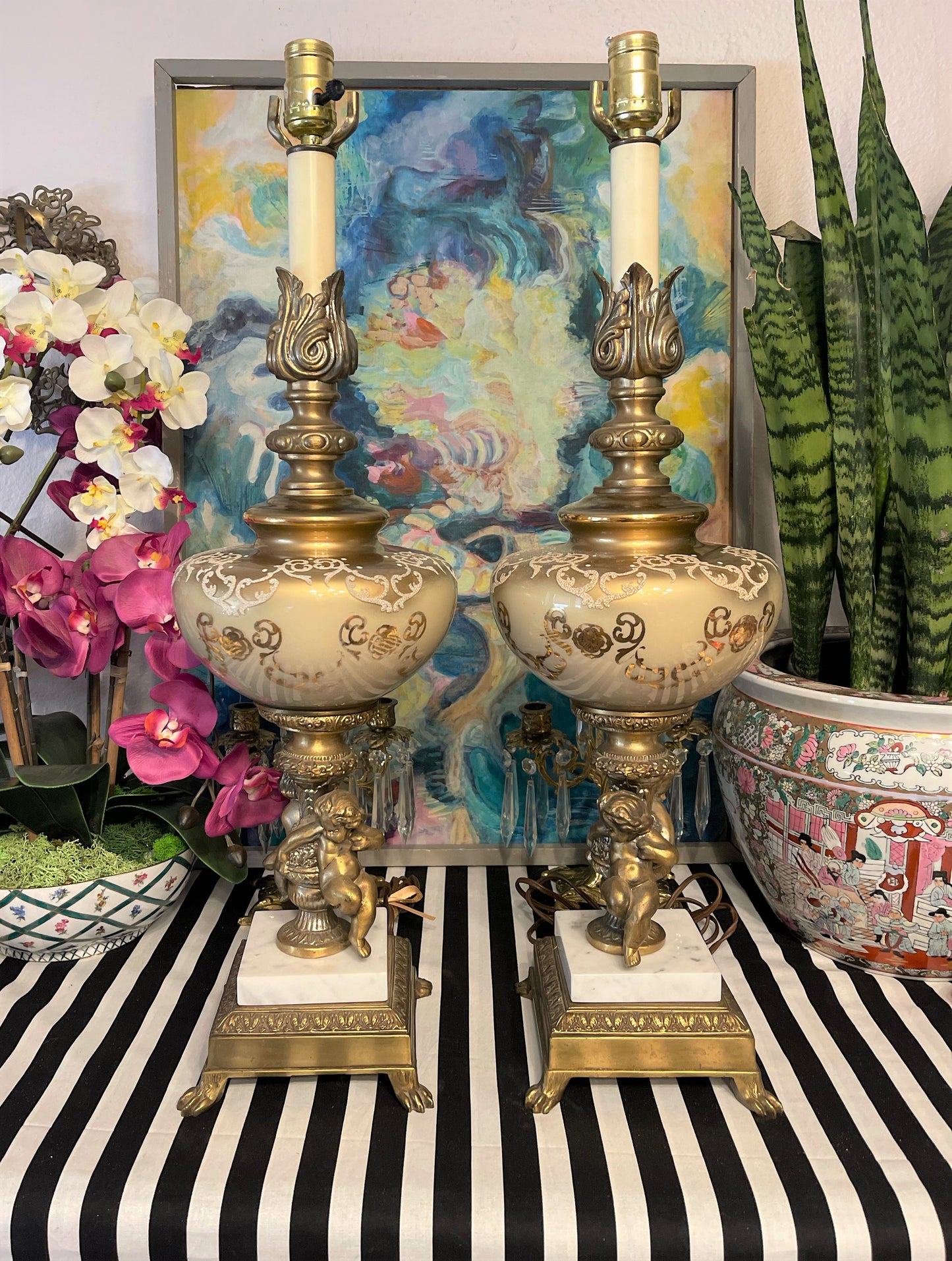 Pair of Hollywood Regency Double Gilt Tole Cherub and Brass Ormolu Lamps, Mid Century