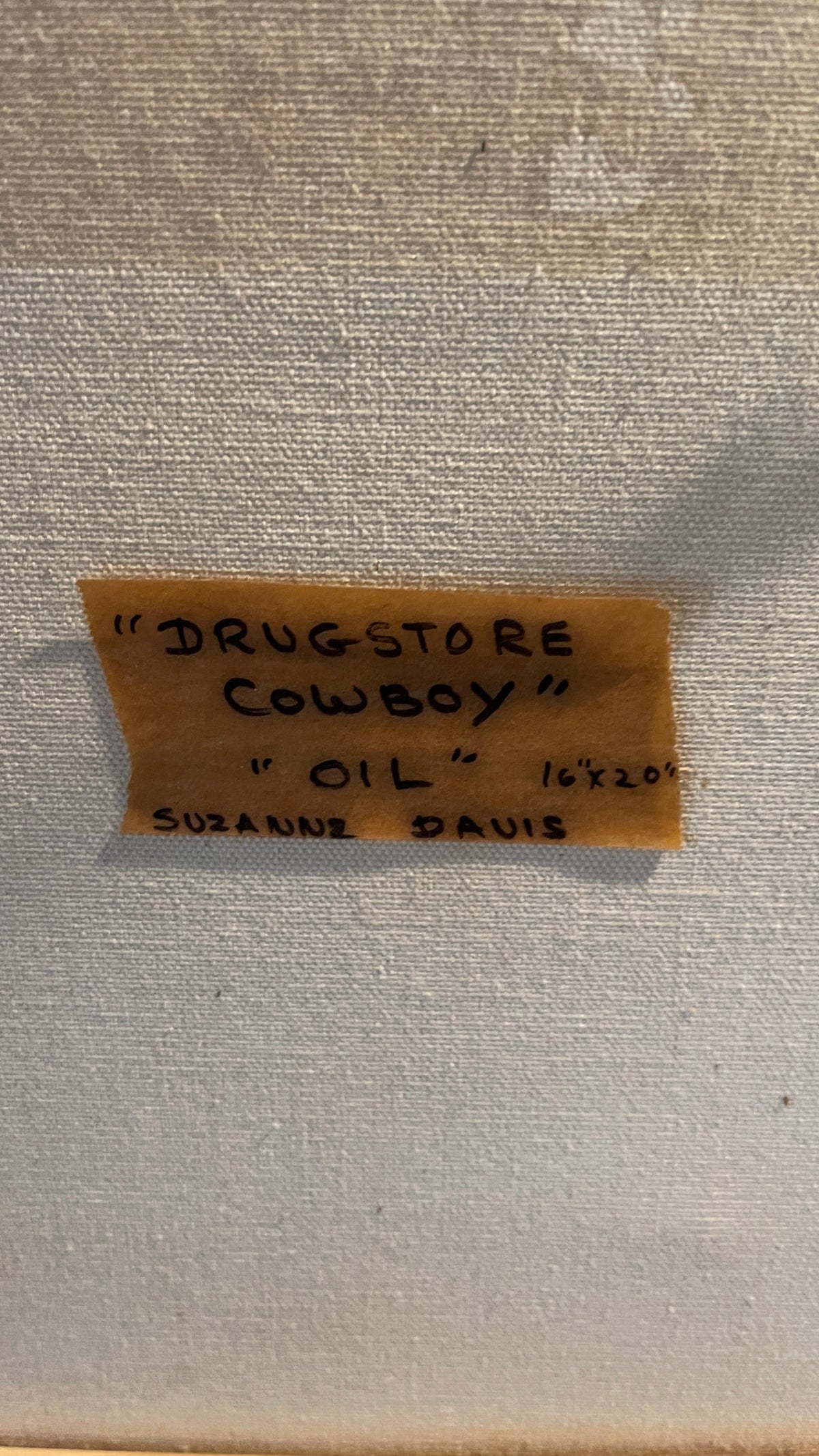 “Drugstore Cowboy” Signed Oil Painting by Suzanne Davis | Gilt Frame | 23.5” H × 19.5” W × 1” D