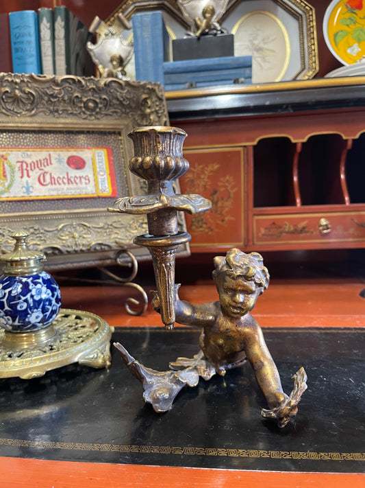 Antique Bronze-Style Cherub Candlestick – Tole Putto with Torch Lying on Laurel Branches
