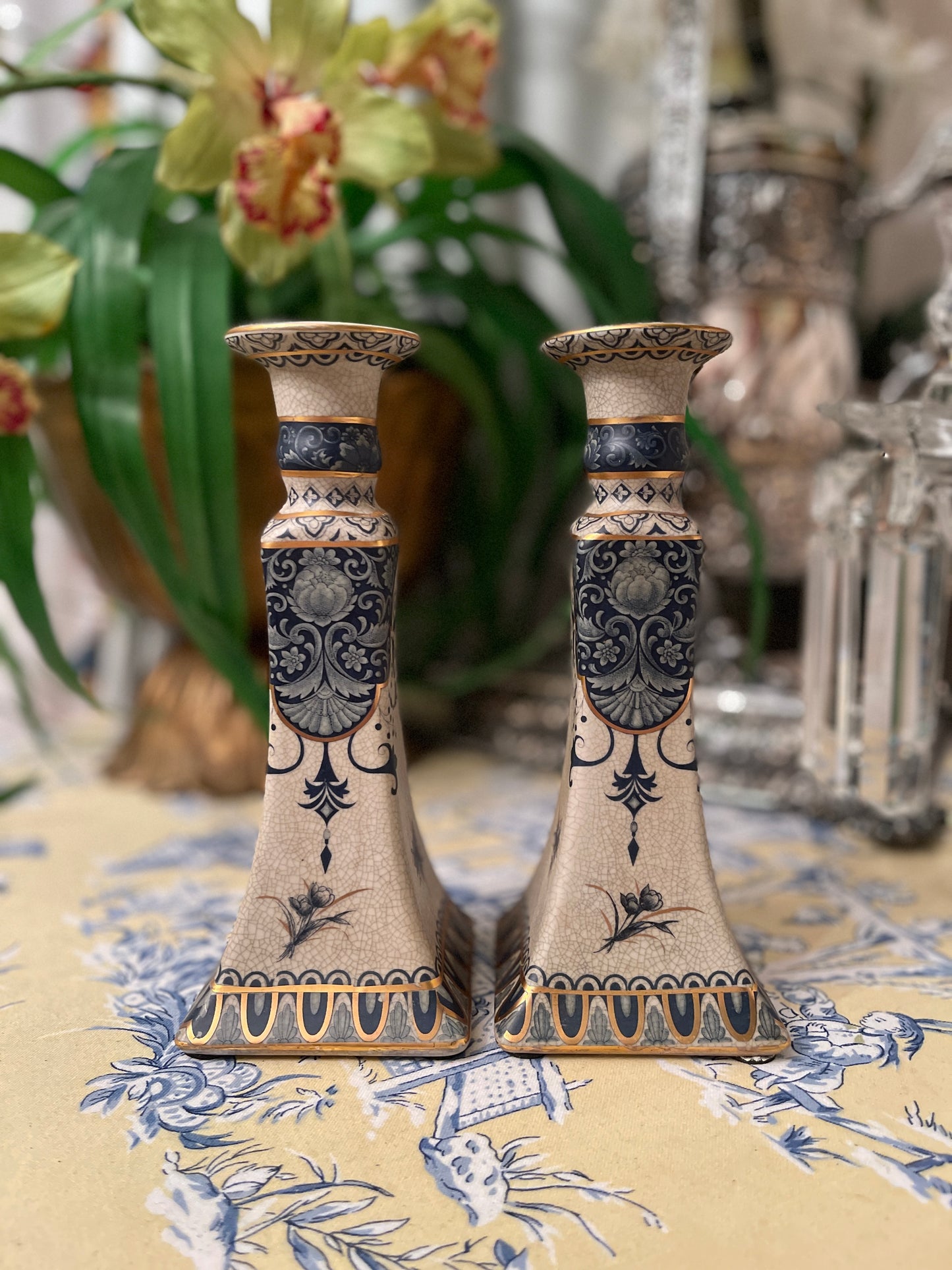 Vintage candlesticks with varying shades of blue and gold on an intentionally crazed finish, Beautifully detailed