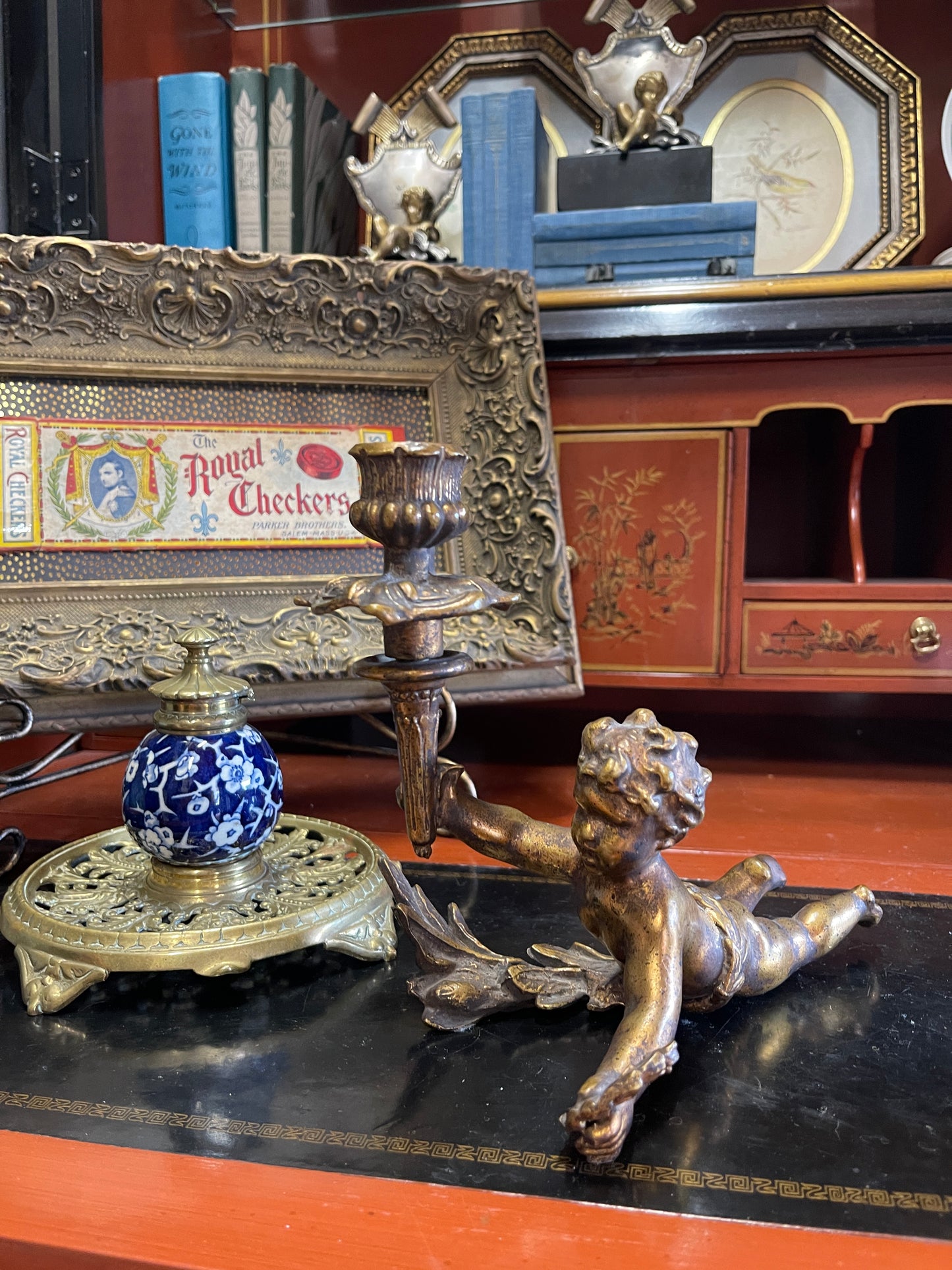Antique Bronze-Style Cherub Candlestick – Tole Putto with Torch Lying on Laurel Branches