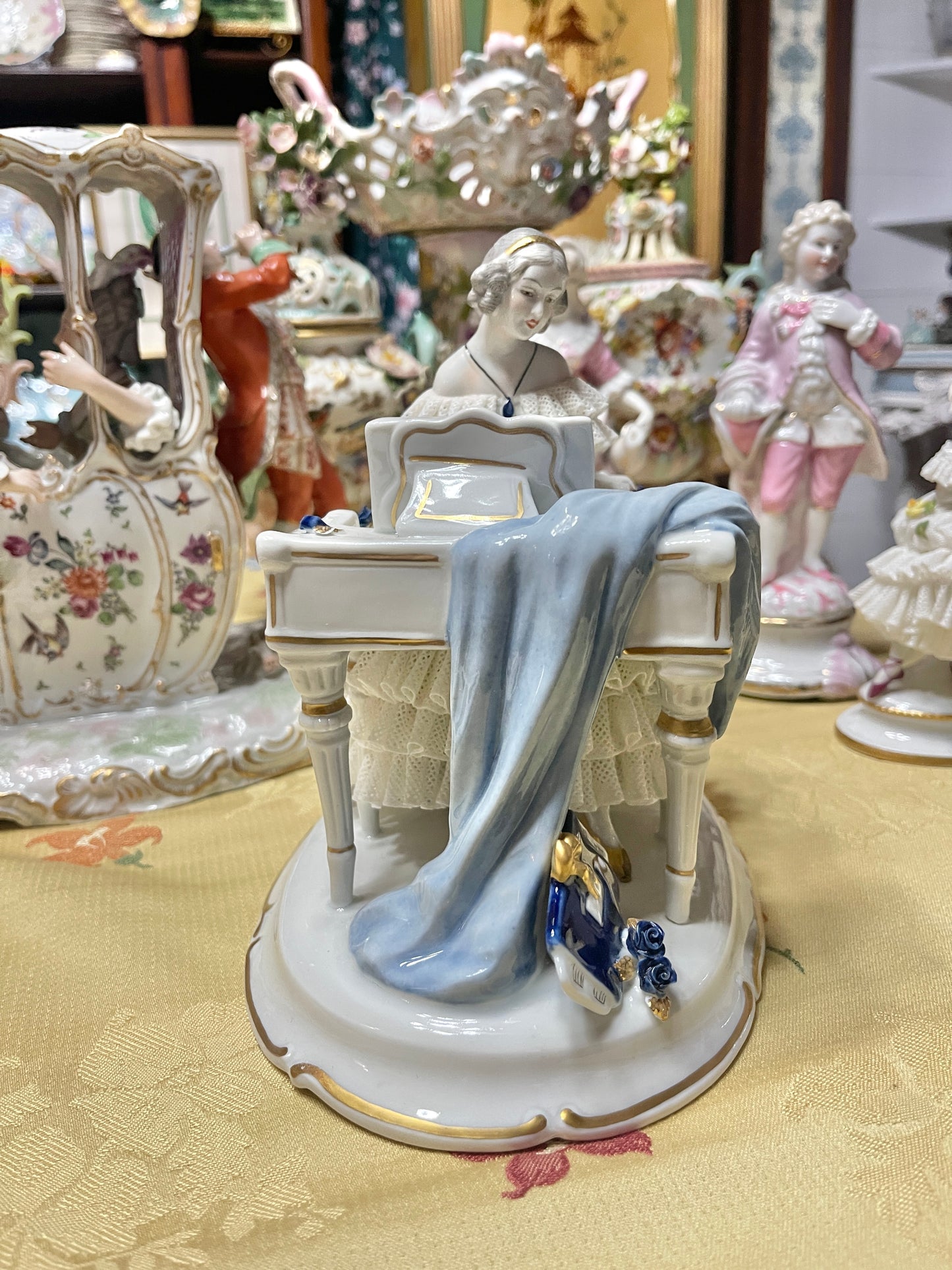 Vintage Royal Dux Bohemia Porcelain Lady at the Piano Figurine, White Porcelain with Blue Applied Roses & Pink Bow — Mid-Century European Figurine