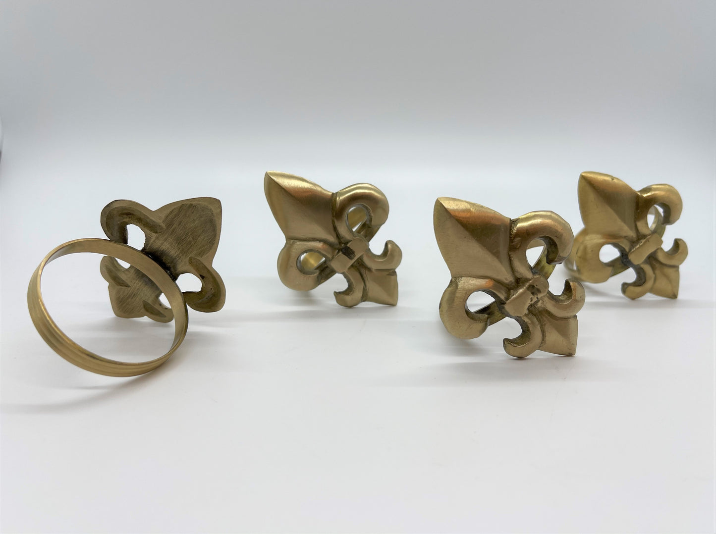 Gold Tole Fleur De Lis Napkin Rings - Set of 4