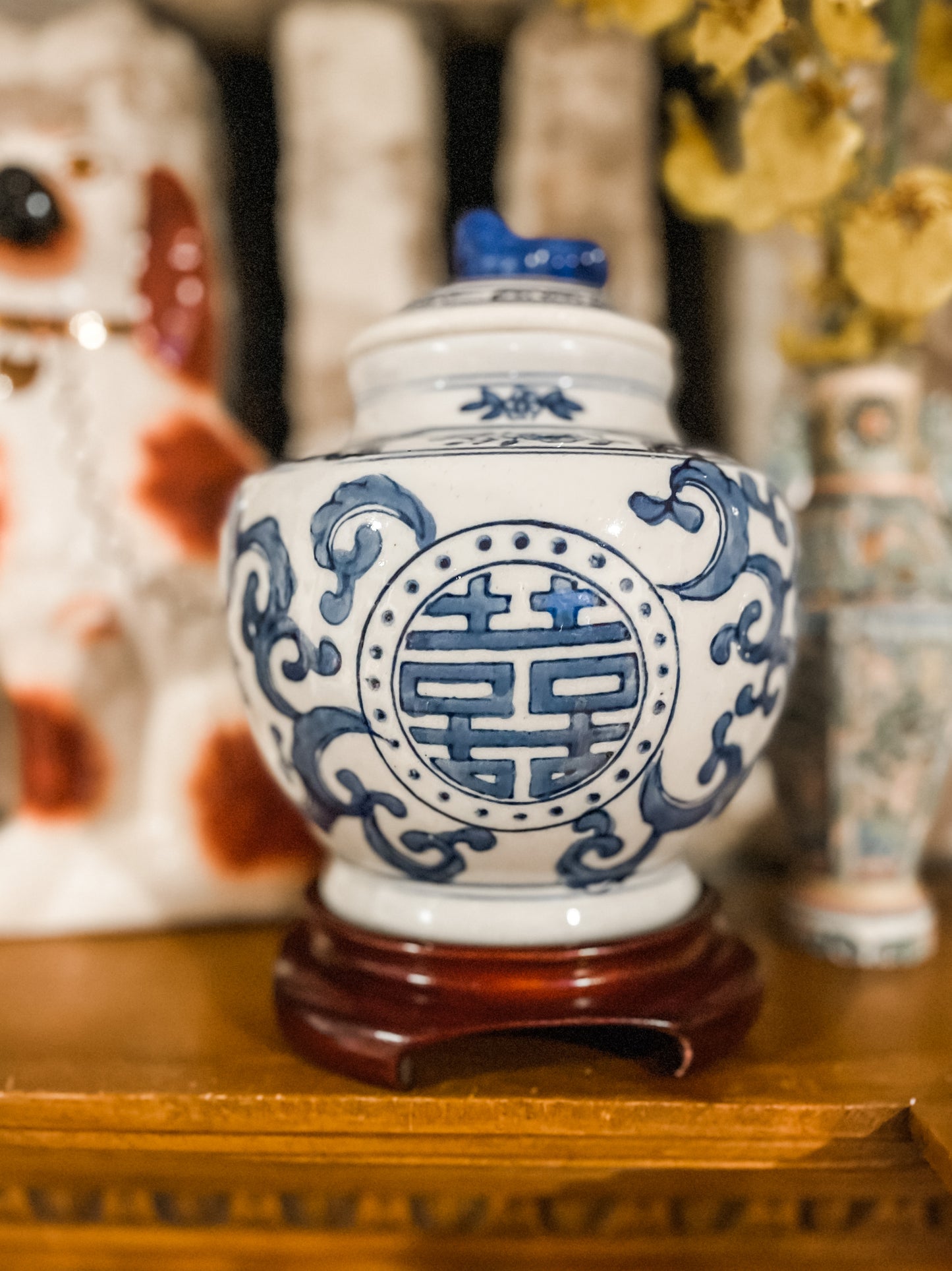 Vintage Blue and White Double Happiness Ginger Jar  with Foo Finial on Ming Wood Base.